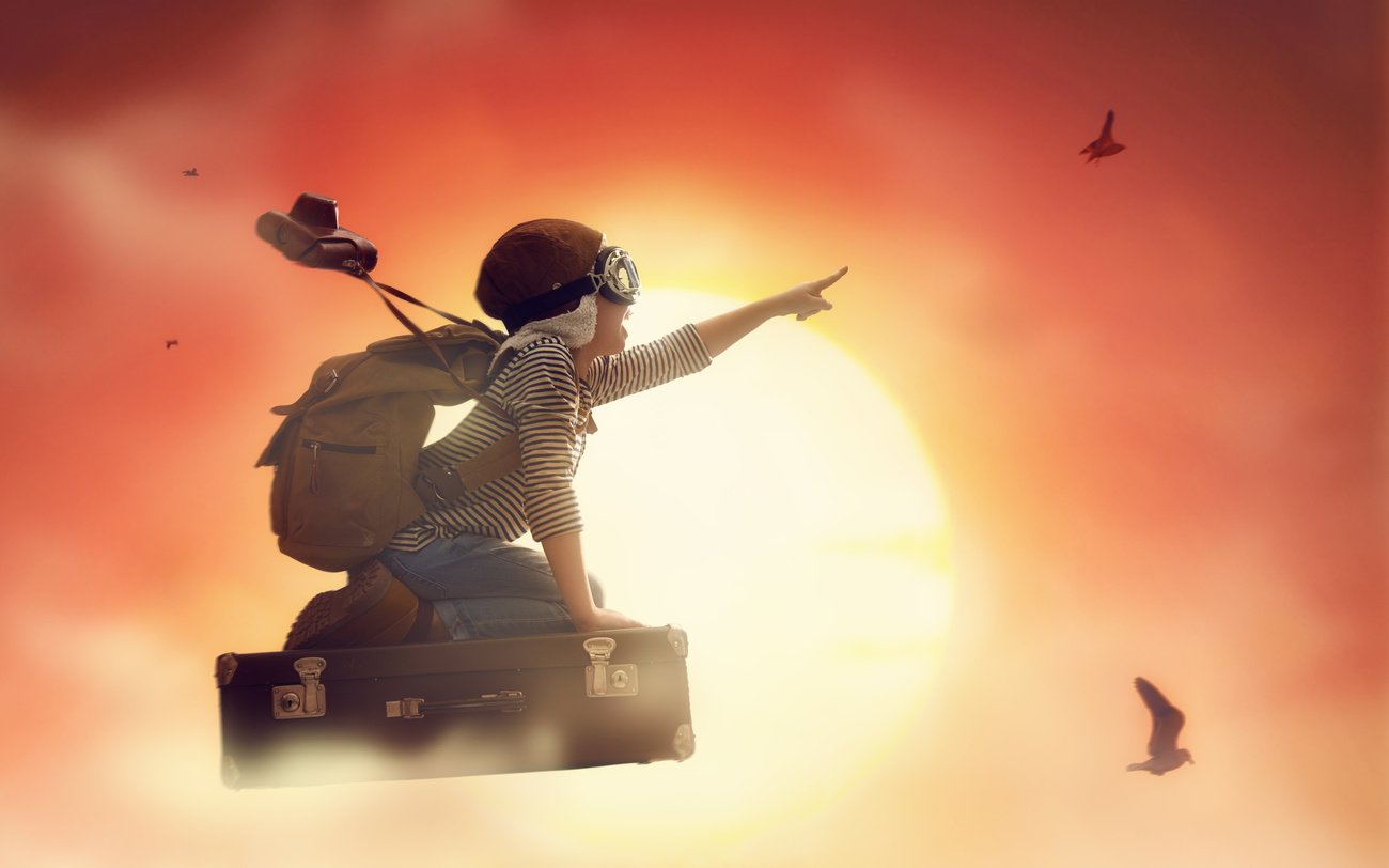 Child Flying on a Suitcase